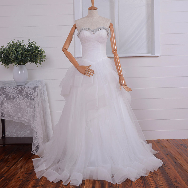 Strapless Sweetheart Jewel Embellished Ruched A-line Wedding Dress Featuring Ruffled Skirt And Lace-up Back